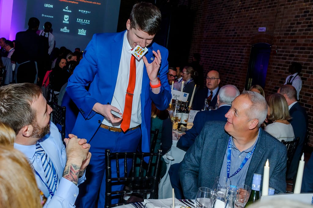 Interactive card magic at a corporate party in Sevenoaks.