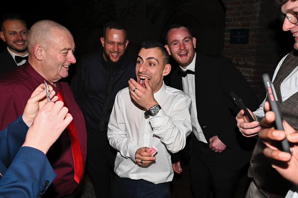 Corporate magician performing close-up magic at a business event in Orpington.