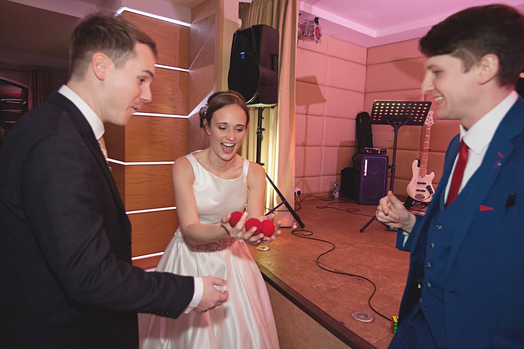 Magician Pete James performing close-up magic for guests in Sevenoaks.