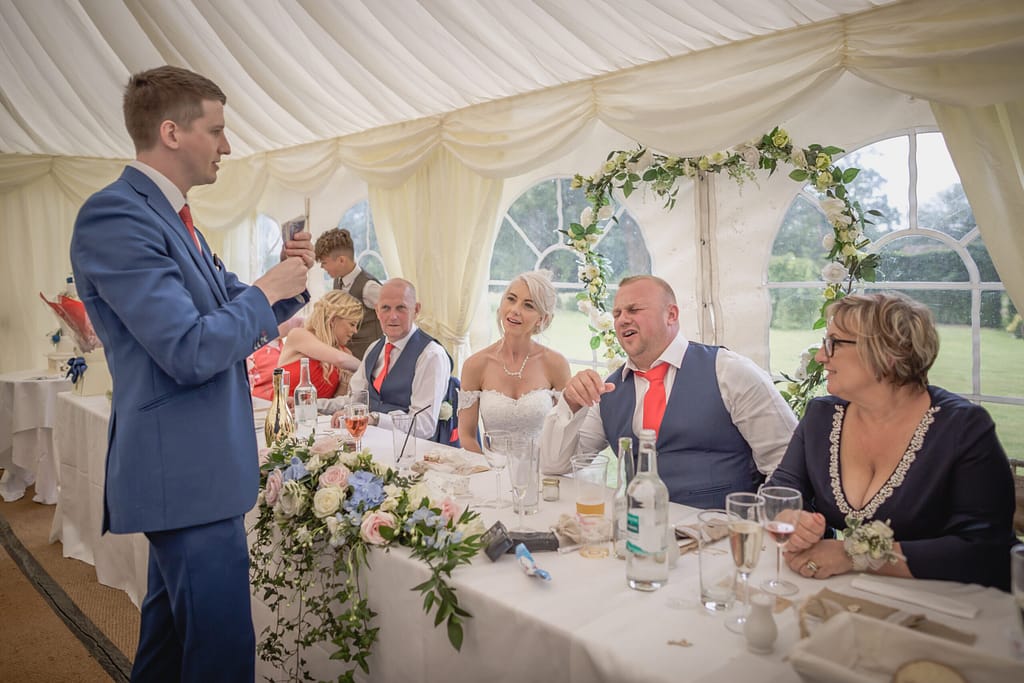 Professional magician entertaining wedding guests with sleight of hand in Kent.