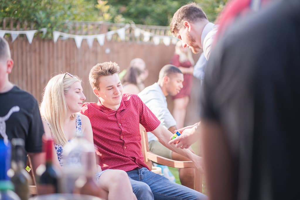 Close-up magician performing at a private party in Orpington.