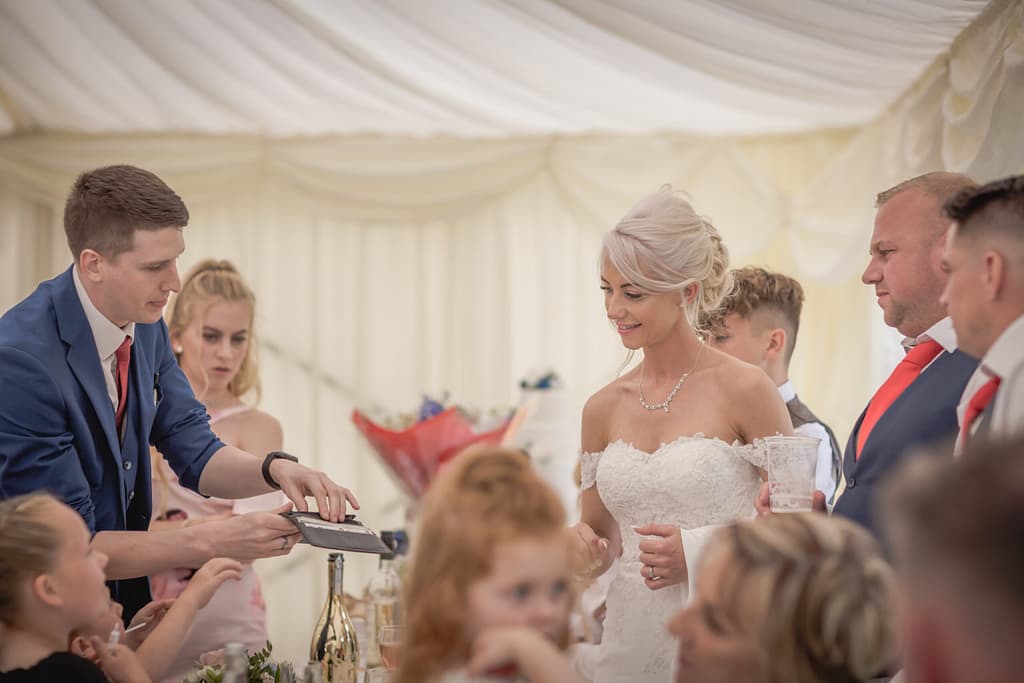 Magician Pete James performing close-up magic for guests in Surrey.