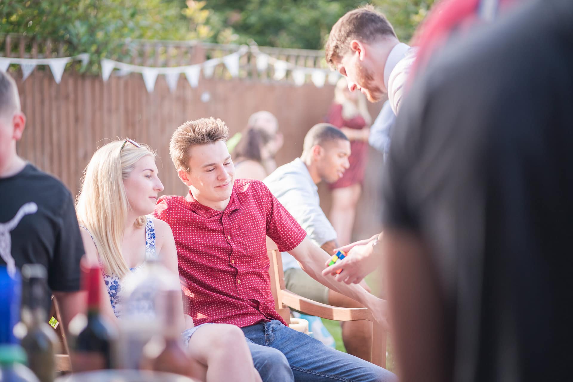 Close-up magician performing at a private party in Orpington.